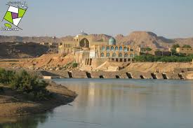 بند میزان در شوشتر زیر سیلاب رفت